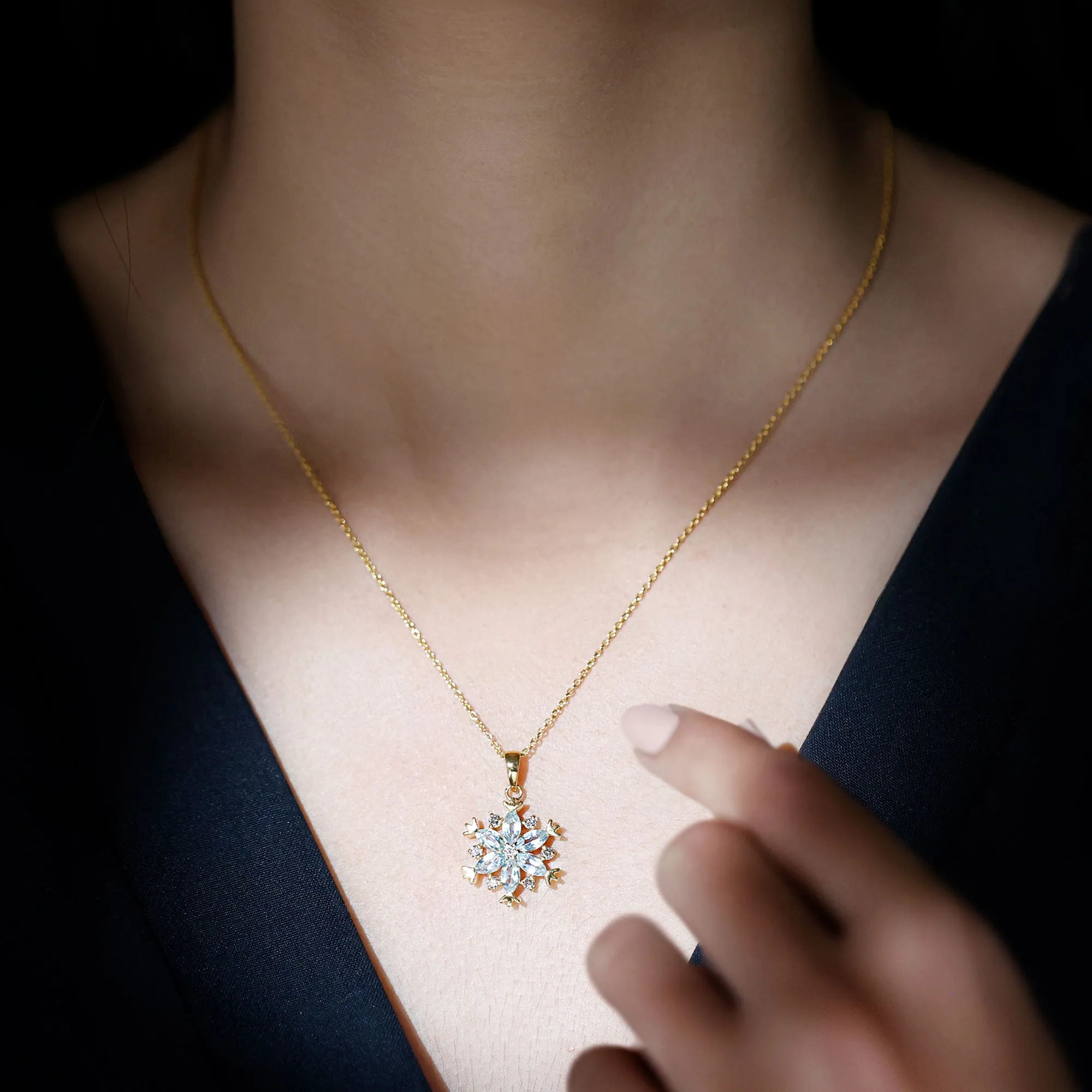 Sky Blue Topaz and Diamond Snowflake Pendant Necklace