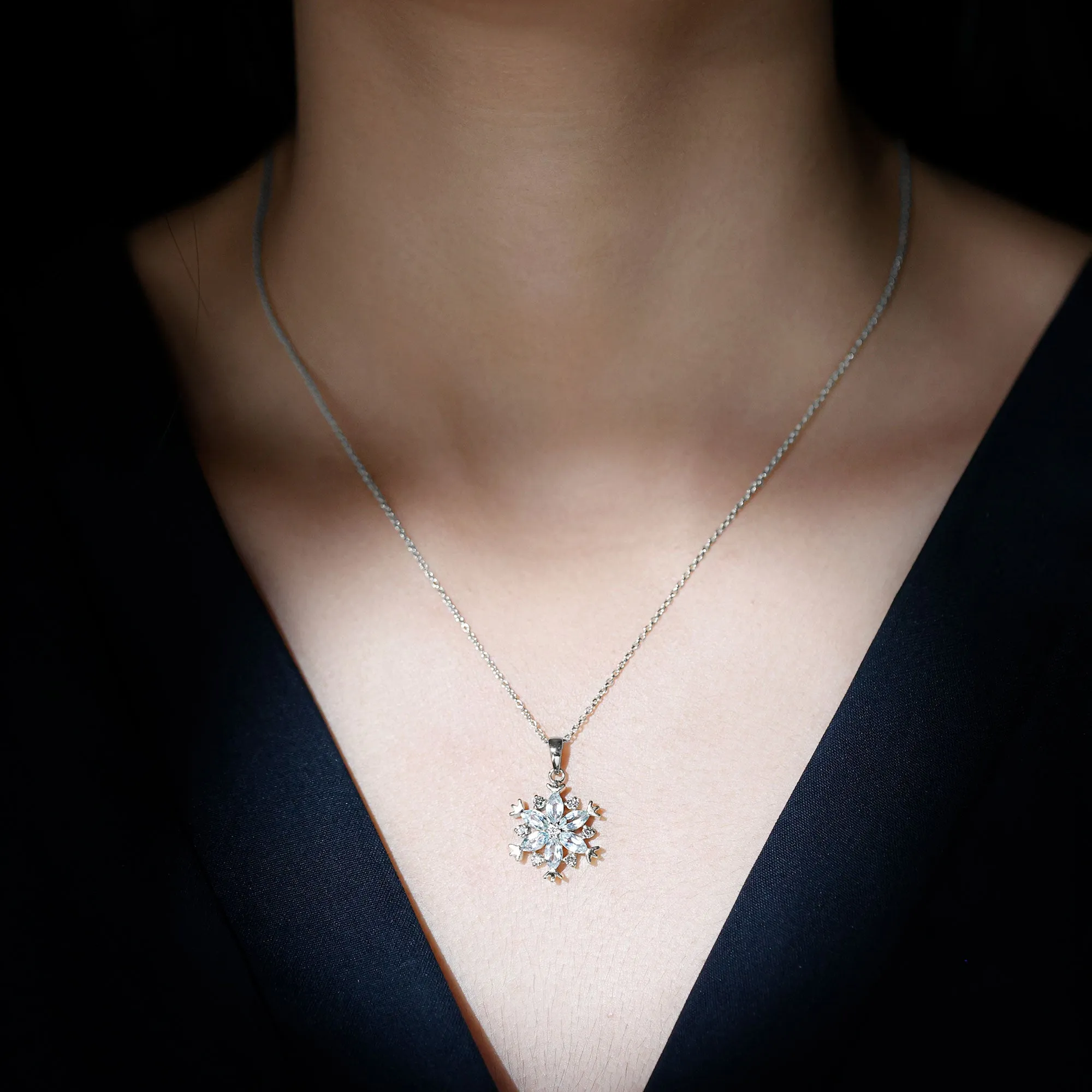 Sky Blue Topaz and Diamond Snowflake Pendant Necklace
