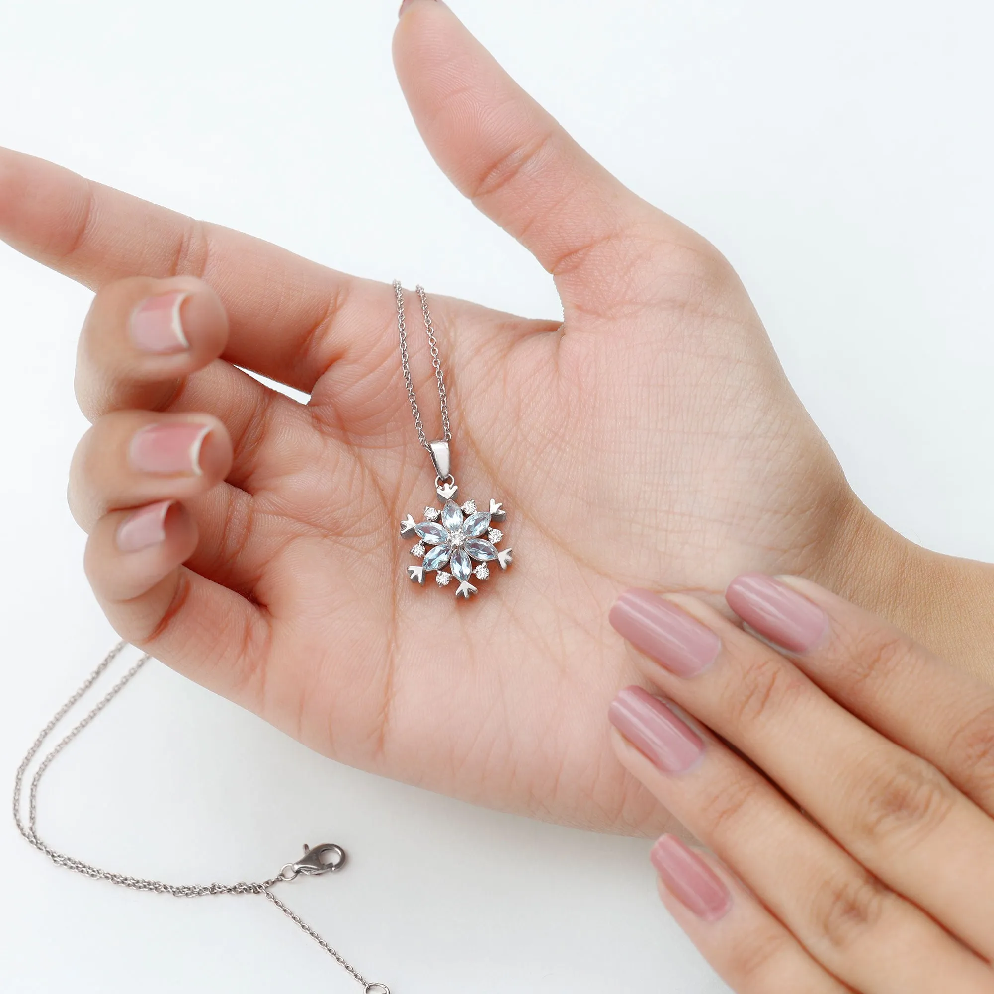 Sky Blue Topaz and Diamond Snowflake Pendant Necklace
